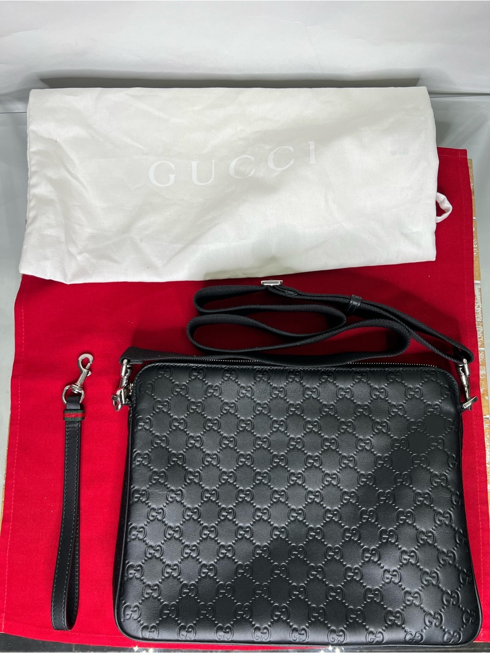 Gucci GG Emblem Medium Crossbody Bag Leather Embossed